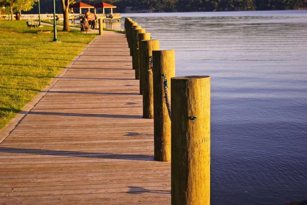 Wooden dock running along the lake at Dardanelle State Park in Arkansas.