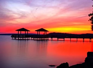 Docks at sunset over Lake Dardanelle in Arkansas (AR).